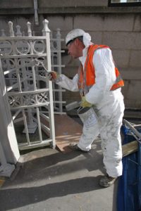 Applying the aluminium undercaot to the South East Turnstile on the South Tower of Tower Bridge